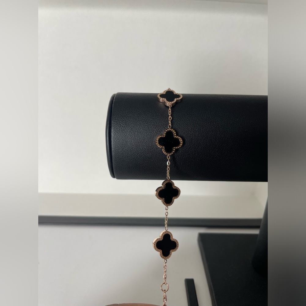 Gold and black clover bracelet